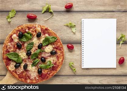 top view arrangement with pizza notebook