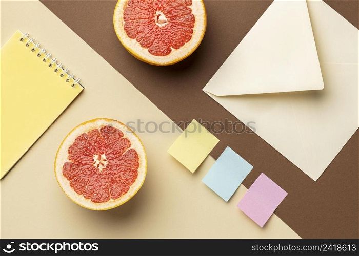 top view arrangement with stationery elements fruits