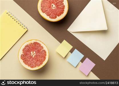 top view arrangement with stationery elements fruits
