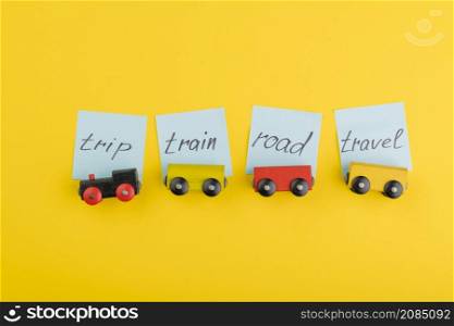 top view arrangement with toys yellow background
