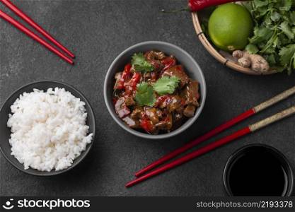 top view asian dish with rice chopsticks