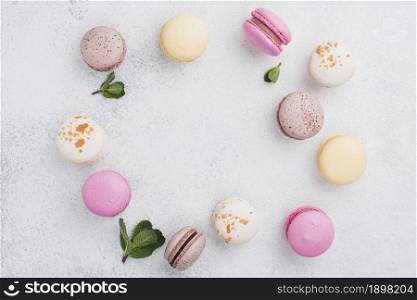 top view assortment macarons with mint. Resolution and high quality beautiful photo. top view assortment macarons with mint. High quality beautiful photo concept