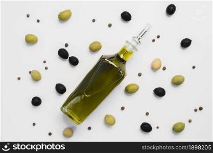 top view assortment olives bottle oil. Resolution and high quality beautiful photo. top view assortment olives bottle oil. High quality beautiful photo concept