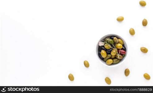 top view assortment olives bowl with copy space. Resolution and high quality beautiful photo. top view assortment olives bowl with copy space. High quality and resolution beautiful photo concept