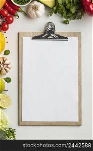 top view assortment vegetables with clipboard