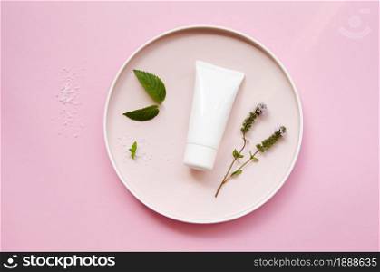 top view assortment with cream bottle and leaves. Resolution and high quality beautiful photo. top view assortment with cream bottle and leaves. High quality and resolution beautiful photo concept