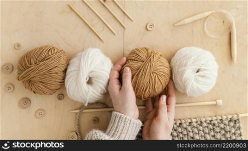 top view assortment with knitting tools