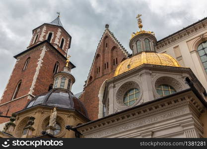 Top view at buildings Wavel royal castle and cathedral church in Krakow, Poland. View at Wavel royal castle and cathedral church in Krakow, Poland