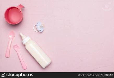 top view baby bottle with pacifier copy space. Resolution and high quality beautiful photo. top view baby bottle with pacifier copy space. High quality and resolution beautiful photo concept