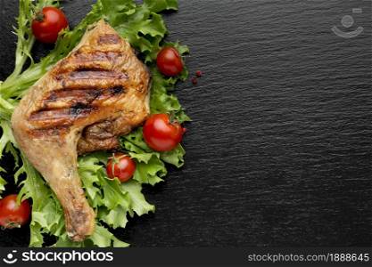 top view baked chicken cherry tomatoes with copy space. Resolution and high quality beautiful photo. top view baked chicken cherry tomatoes with copy space. High quality and resolution beautiful photo concept