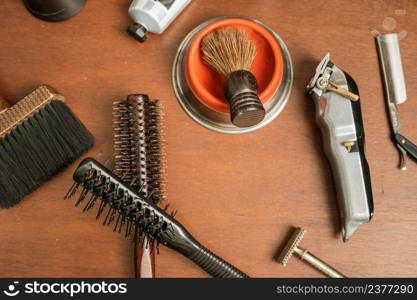 Top view barber tools on the shelf in the barbershop. High quality photography. Top view barber tools on the shelf in the barbershop.