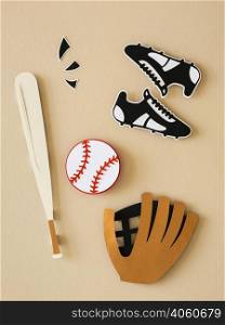 top view baseball bat with sneakers glove