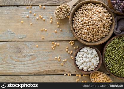 top view beans arrangement wooden table. Resolution and high quality beautiful photo. top view beans arrangement wooden table. High quality and resolution beautiful photo concept