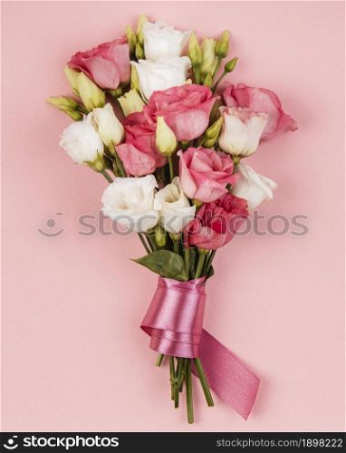 top view beautiful roses bouquet with pink ribbon. Resolution and high quality beautiful photo. top view beautiful roses bouquet with pink ribbon. High quality beautiful photo concept
