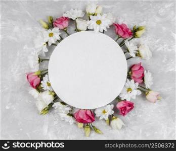 top view beautiful spring flowers composition with round empty card