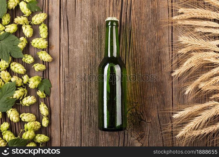 top view beer bottle with ingredients. Resolution and high quality beautiful photo. top view beer bottle with ingredients. High quality and resolution beautiful photo concept