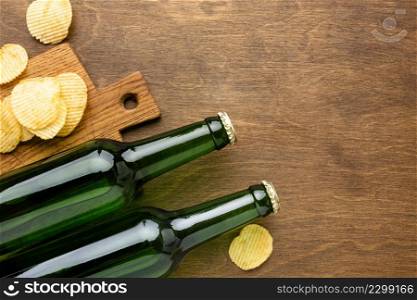 top view beer bottles with chips