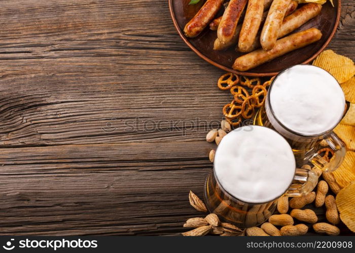 top view beer with food wooden table