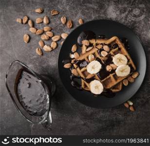 top view belgian waffle with banana. High resolution photo. top view belgian waffle with banana. High quality photo