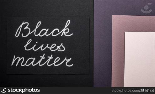 top view black lives matter card multicolored paper