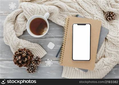 top view blank phone agendas with tea mug