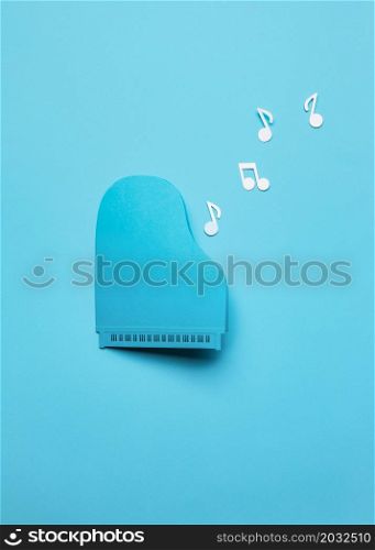 top view blue piano arrangement with musical notes