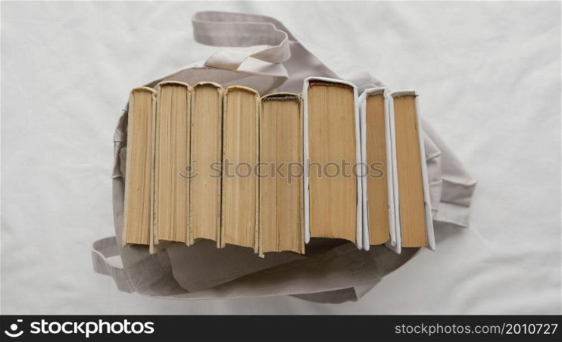 top view books stack bag