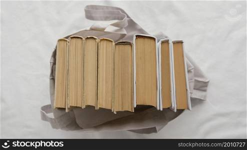 top view books stack bag