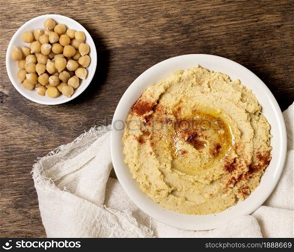 top view bowl hummus with chickpeas. Resolution and high quality beautiful photo. top view bowl hummus with chickpeas. High quality and resolution beautiful photo concept