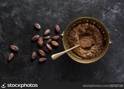 top view bowl with cocoa powder cocoa beans