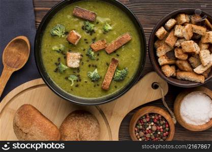 top view bowl with winter broccoli soup croutons