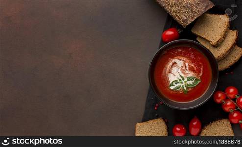 top view bowl with winter tomato soup bowl toast. Resolution and high quality beautiful photo. top view bowl with winter tomato soup bowl toast. High quality and resolution beautiful photo concept