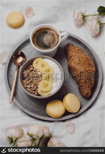 top view breakfast bowl with cereal croissant