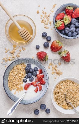 top view breakfast bowl with honey fruits