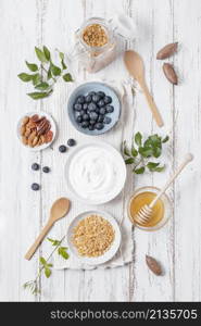 top view breakfast bowls with fruits table