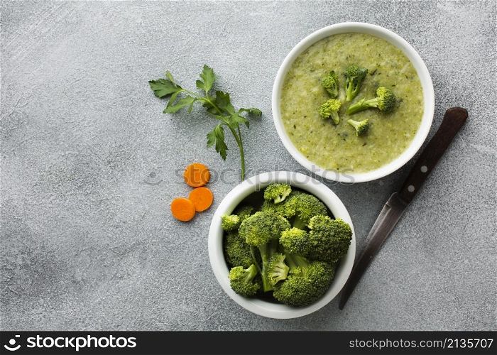 top view broccoli carrots bisque with copy space