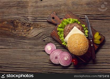 top view burger ingredients wooden table. High resolution photo. top view burger ingredients wooden table. High quality photo