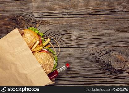 top view burger with french fries bag