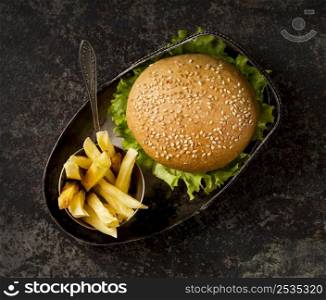 top view burger with salad fries