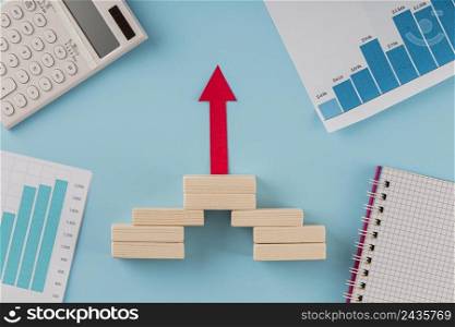 top view business items with growth chart arrow