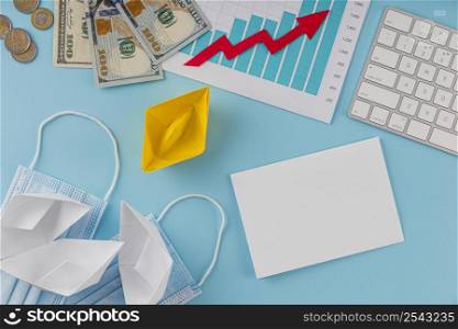 top view business items with growth chart banknotes