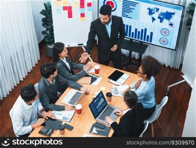 Top view business presentation with data analysis dashboard on TV screen in modern meeting room. Business people brainstorming or working together to plan business marketing strategy. Concord. Top view business presentation with data analysis dashboard on TV. Concord