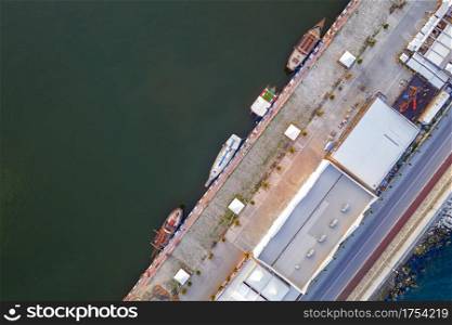Top View by Drone of yachts or small boats moored at the quay. Parking