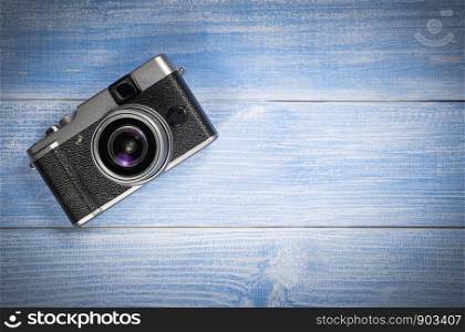Top view camera on blue wooden table