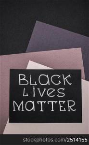 top view card with black lives matter multicolored paper