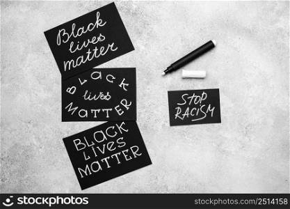 top view cards with black lives matter pen