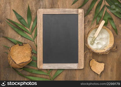 top view chalkboard with powder coconut shell leaves