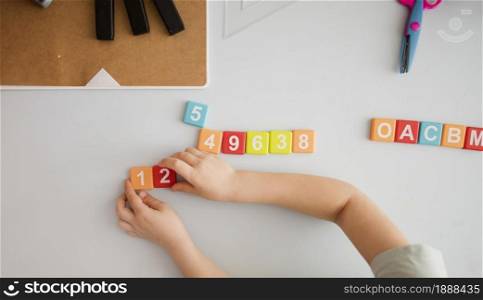 top view child desk learning numbers letters 1. Resolution and high quality beautiful photo. top view child desk learning numbers letters 1. High quality and resolution beautiful photo concept