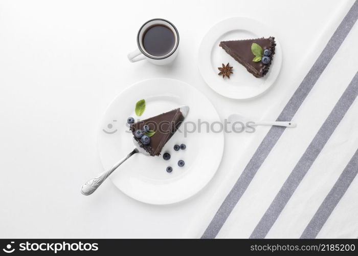 top view chocolate cake slices plates