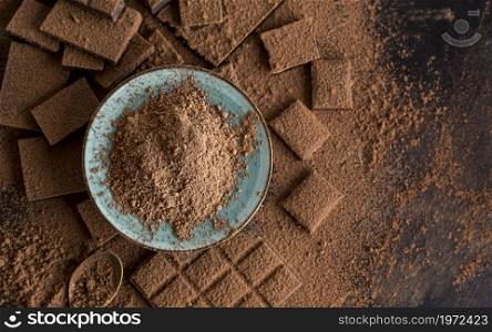 top view chocolate with cocoa powder. High resolution photo. top view chocolate with cocoa powder. High quality photo